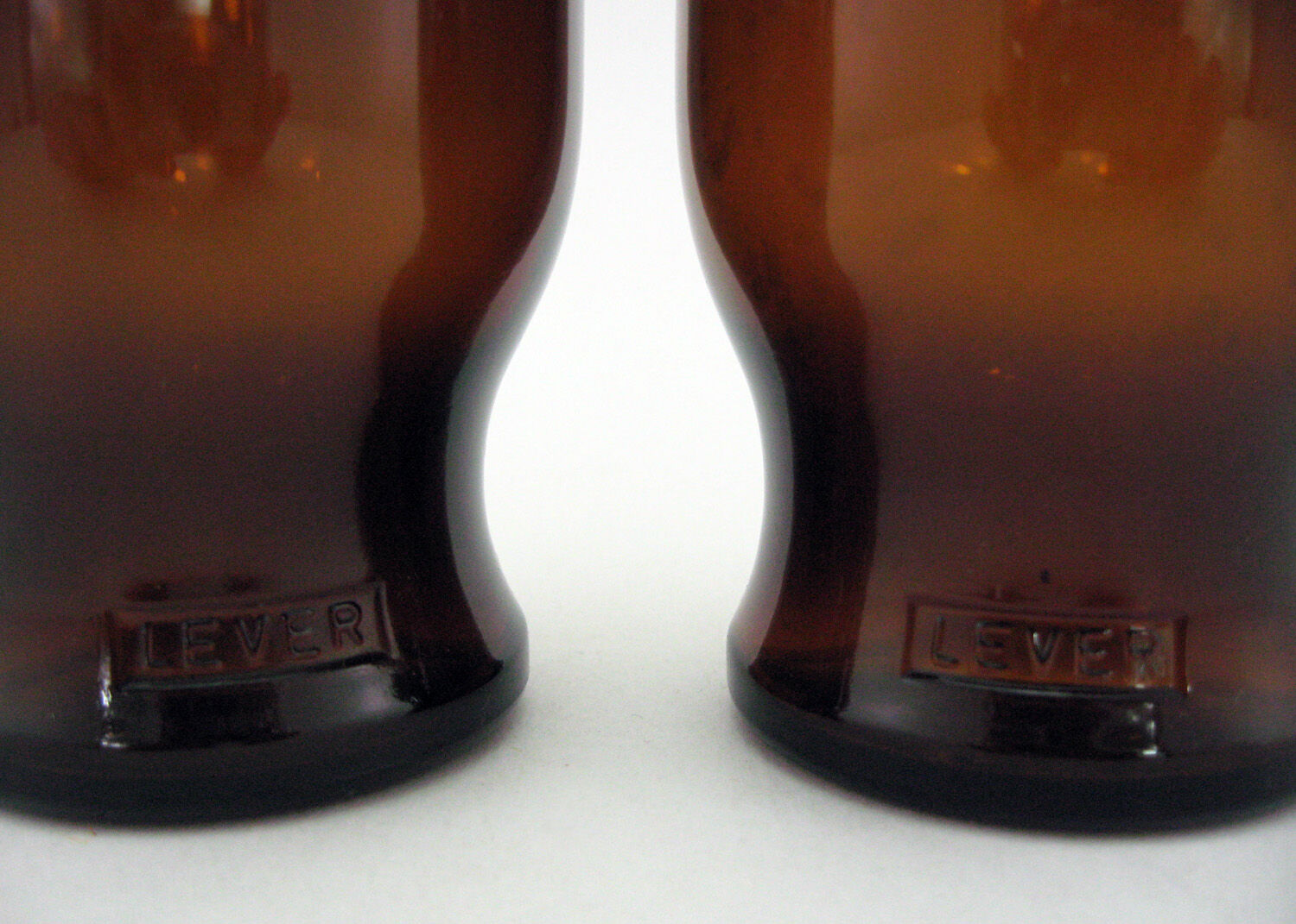 2 brown glass jars - Lever made in Belgium 1970