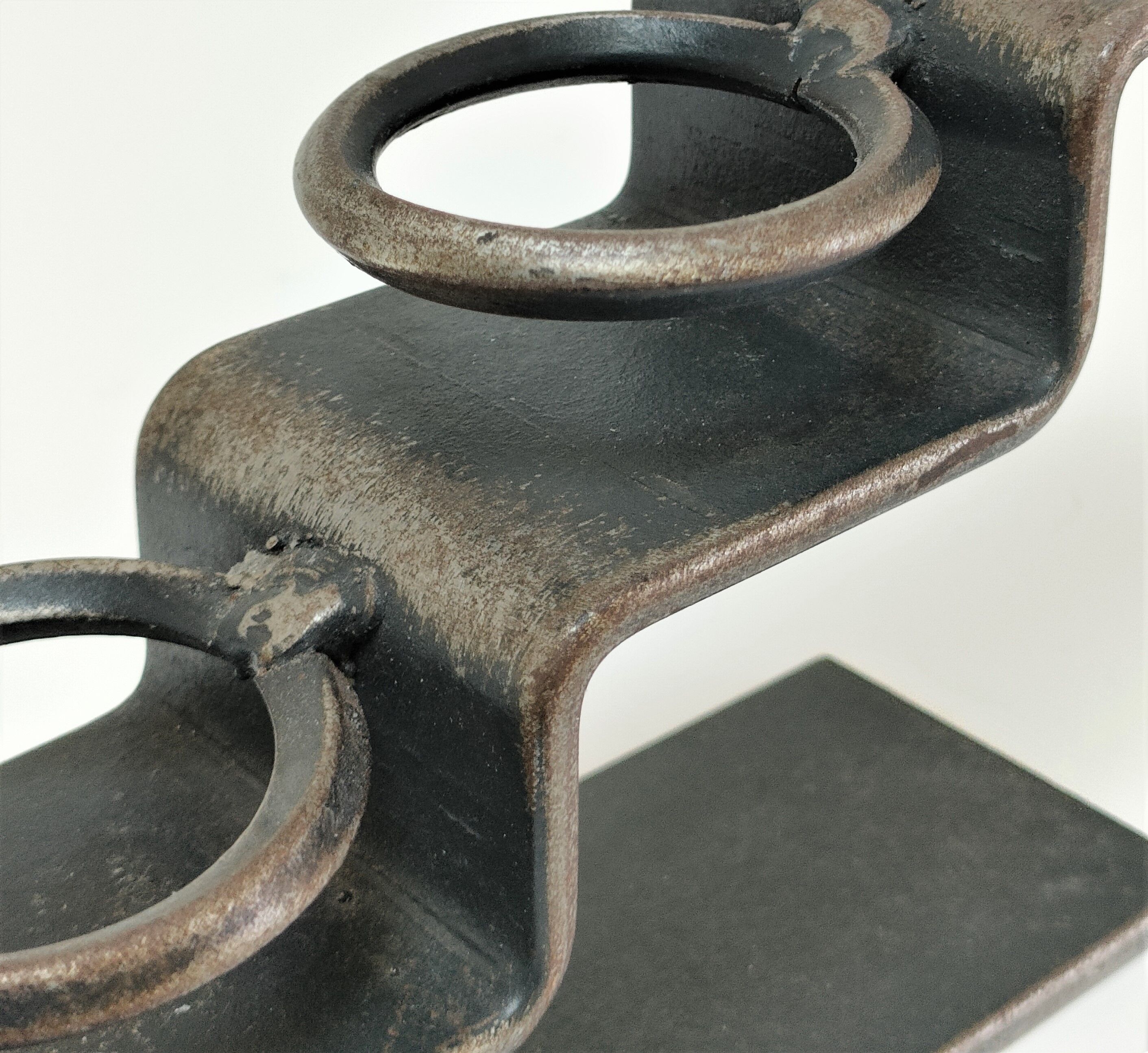 Sculptural candle holder patinated steel design 80s