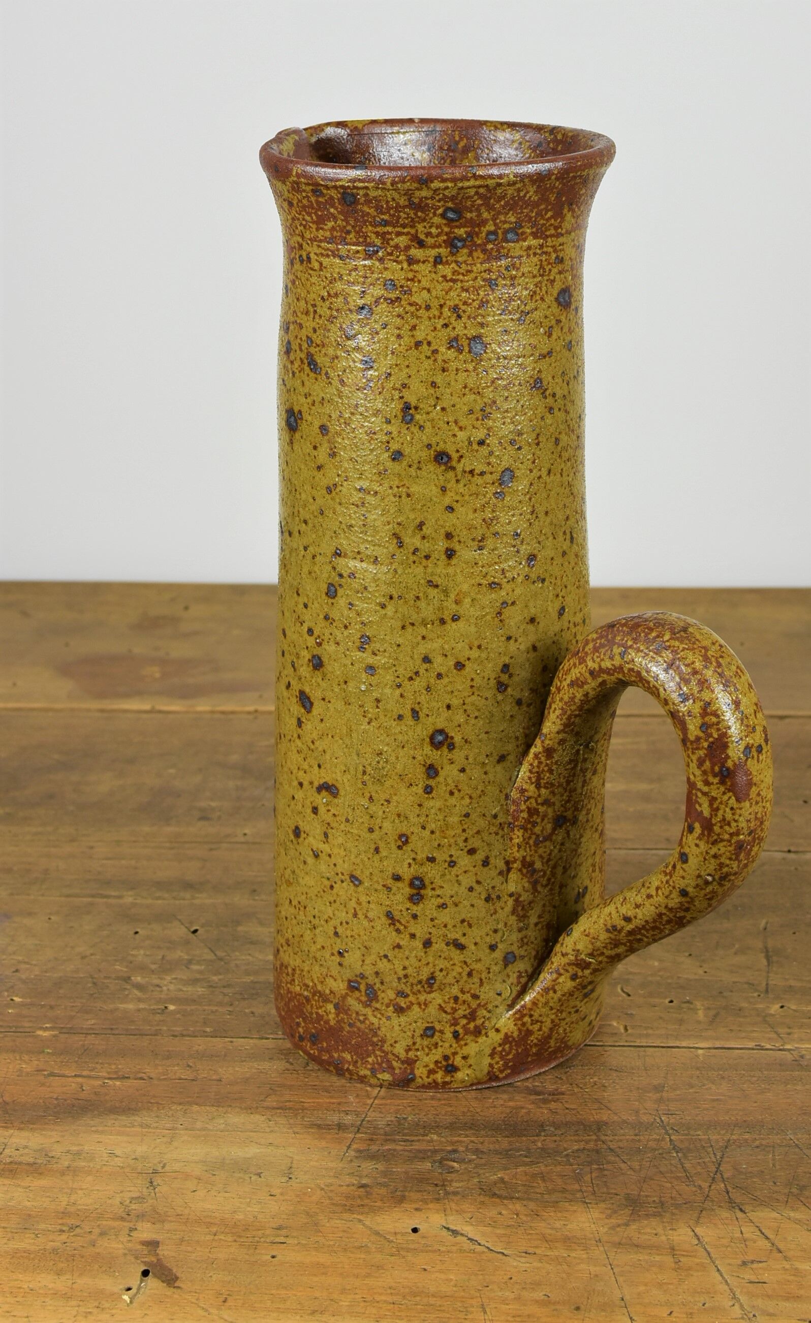 Sandstone pitcher signed "Guy Baudat"