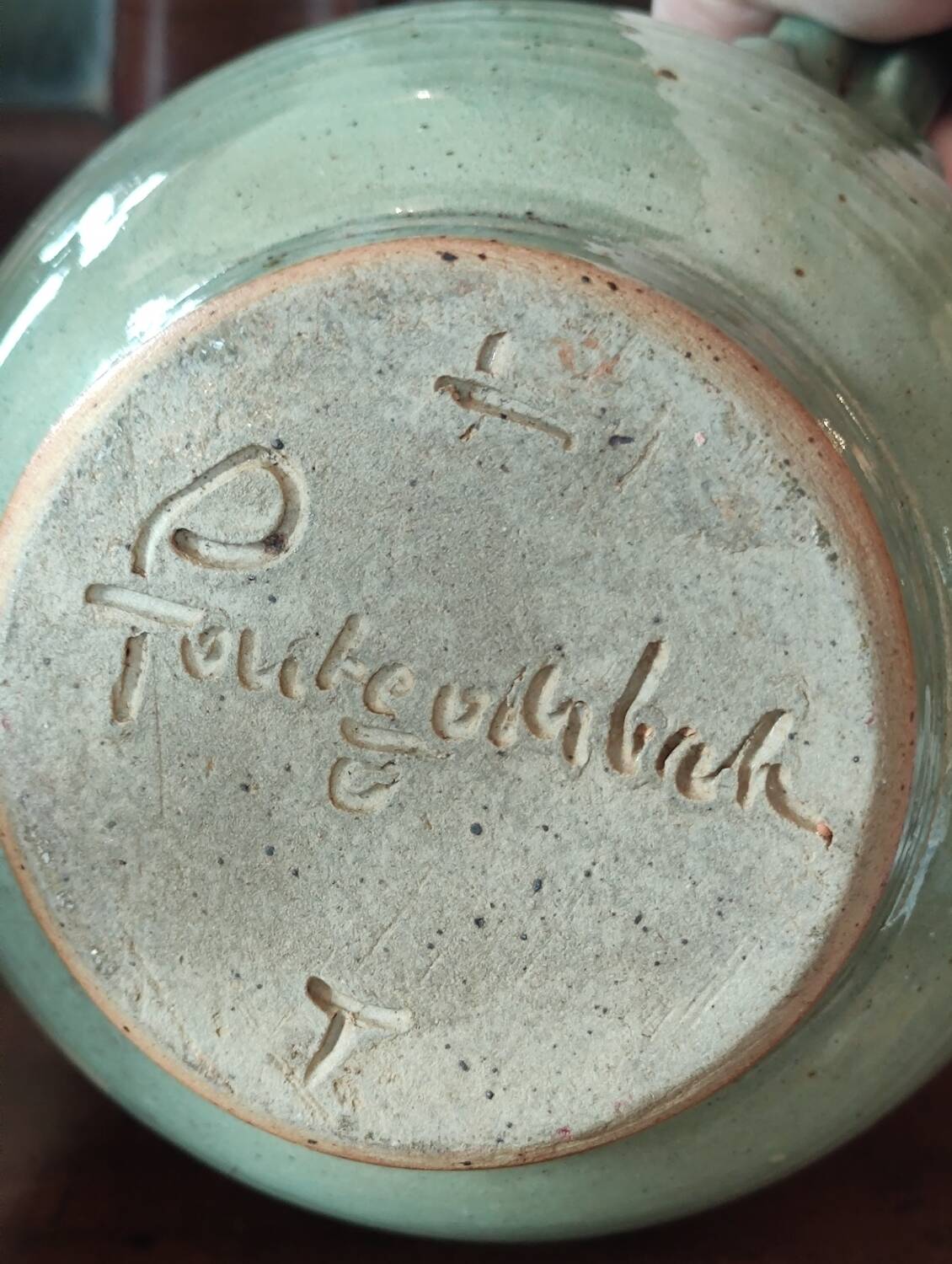 Old small glazed ceramic pottery pitcher