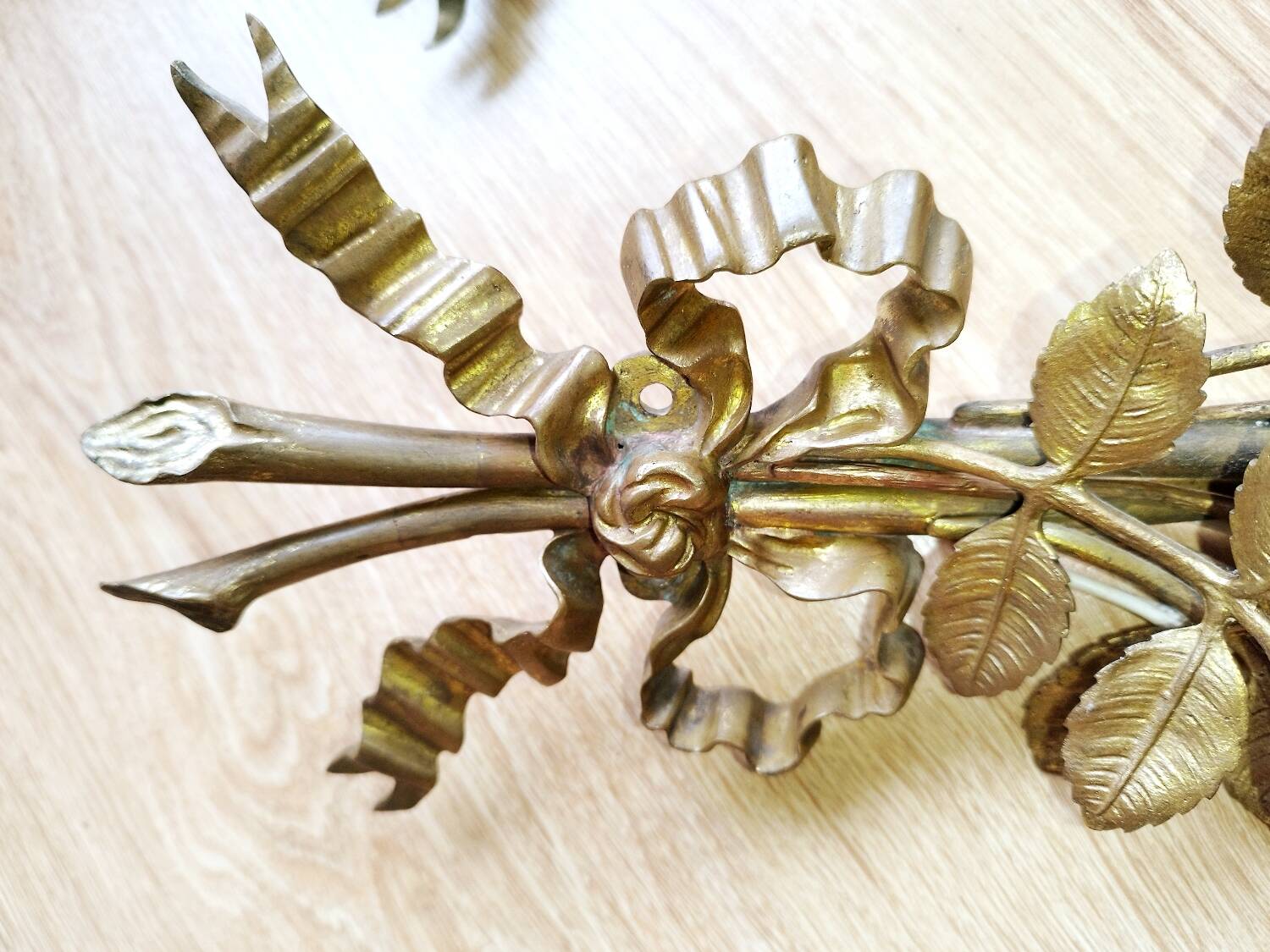 Pair of bronze and gilded metal wall sconces in the Louis XVI style.