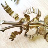 Pair of bronze and gilded metal wall sconces in the Louis XVI style.