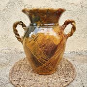 Ancient large vase in glazed speckled terracotta