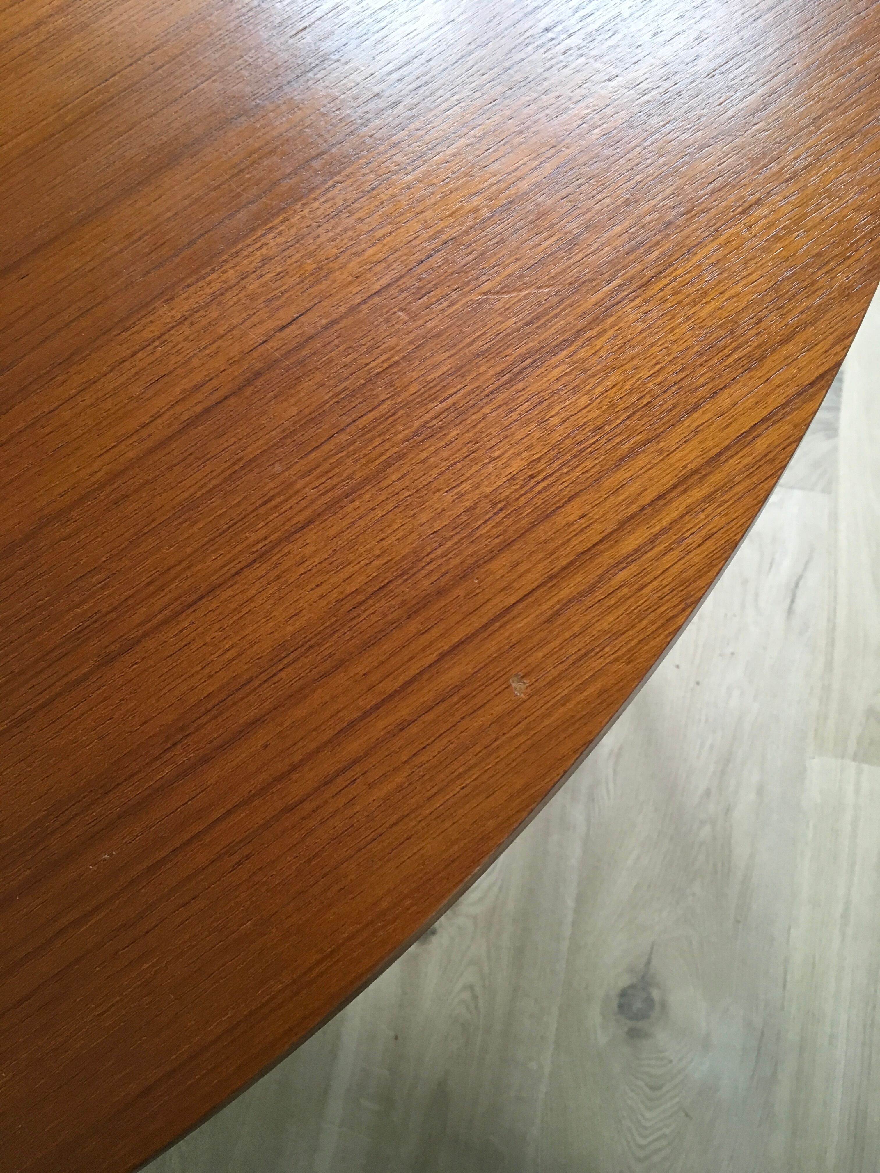 Extended round table in teak 60s