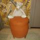 Pouf art deco in suede fabric color orange wooden legs