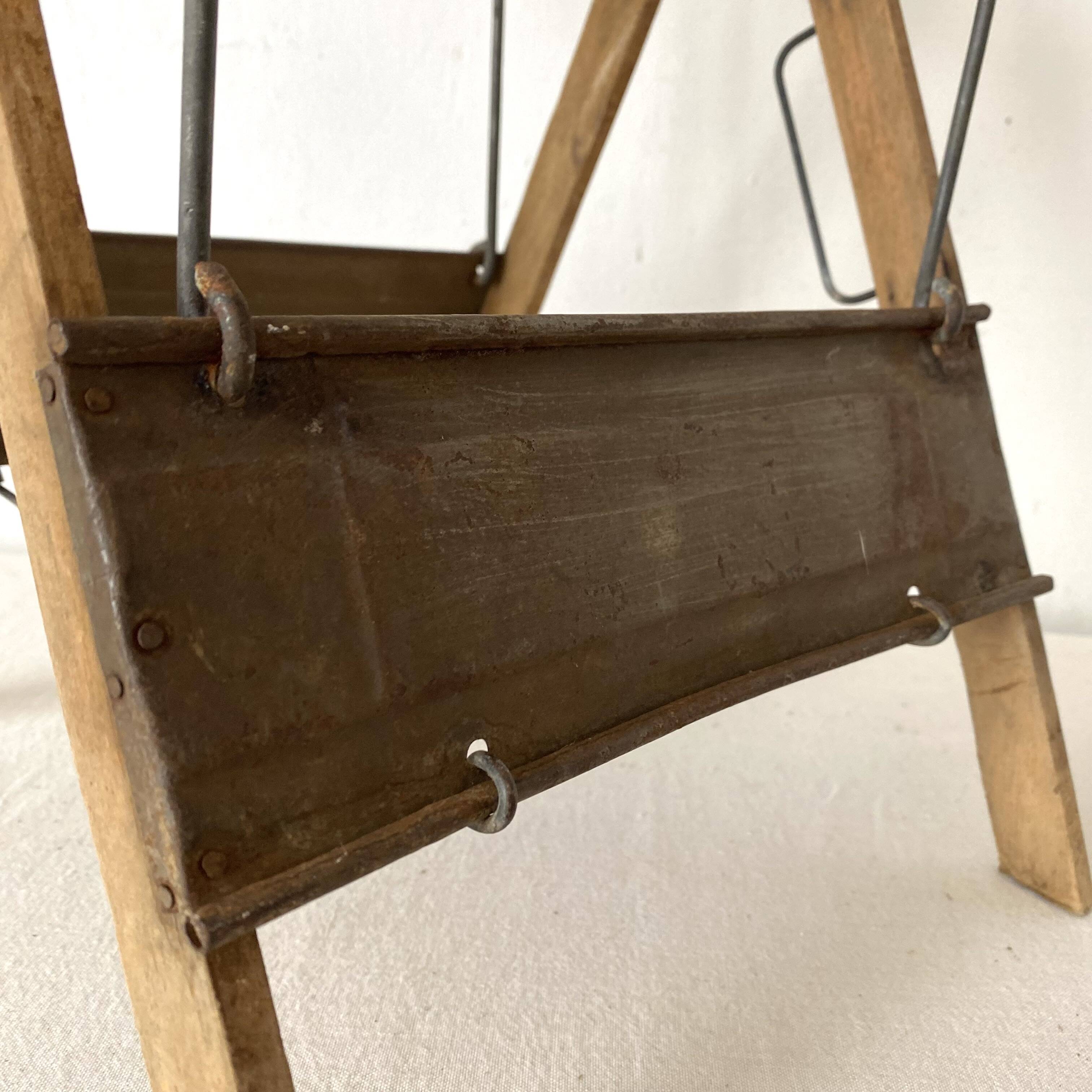 Antique folding stool with slats, plant holder