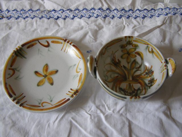 Old bowl and its ceramic saucer from Quimper