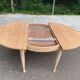 Renovated round extendable Scandinavian dining table in teak, 110cm.
