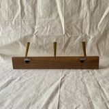 Vintage wooden wall-mounted coat rack with 3 golden cast aluminum hooks
