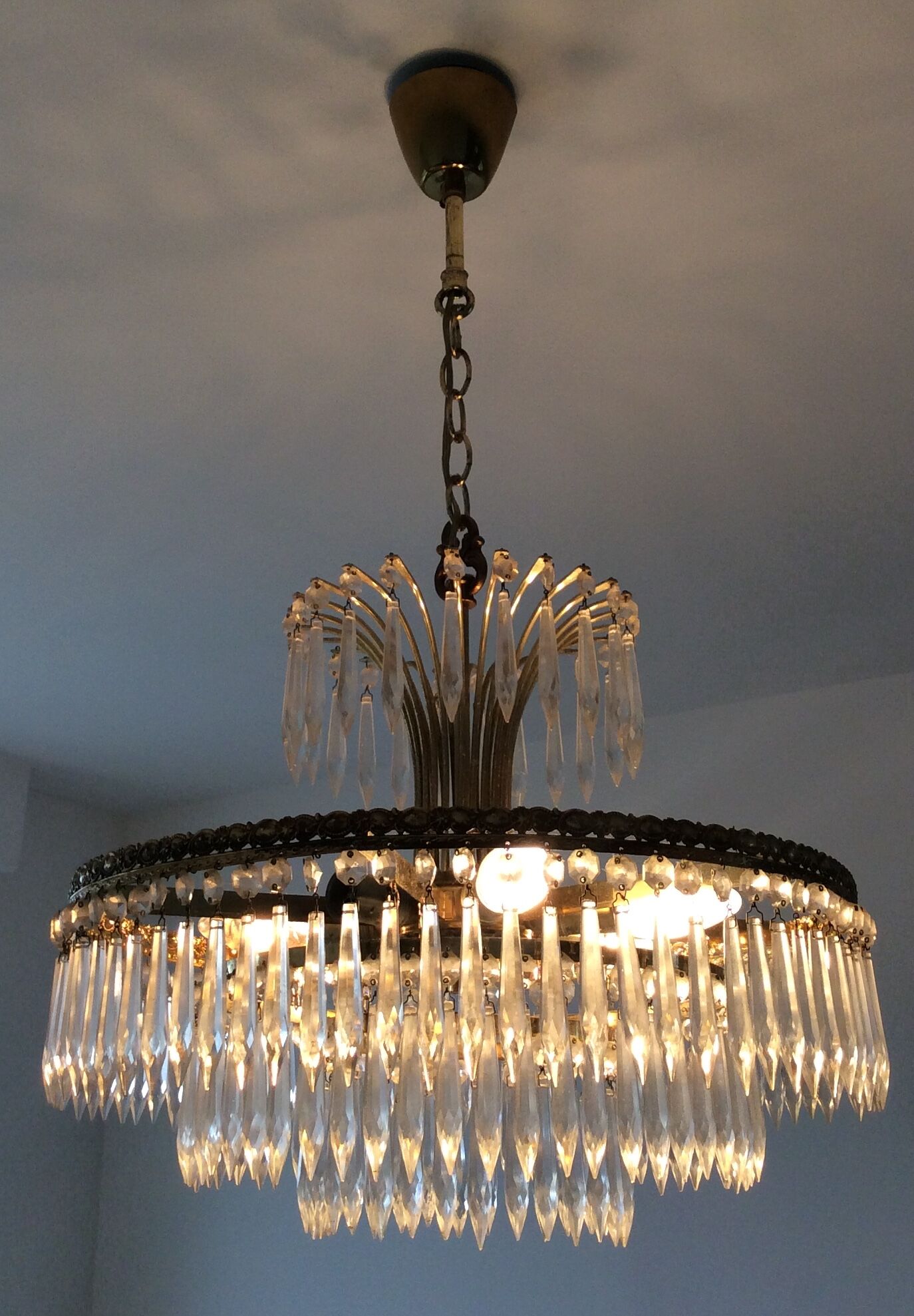 Old waterfall chandelier with grapevines and bronze