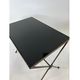 Modernist nesting tables in metal and black glass, 1950s.