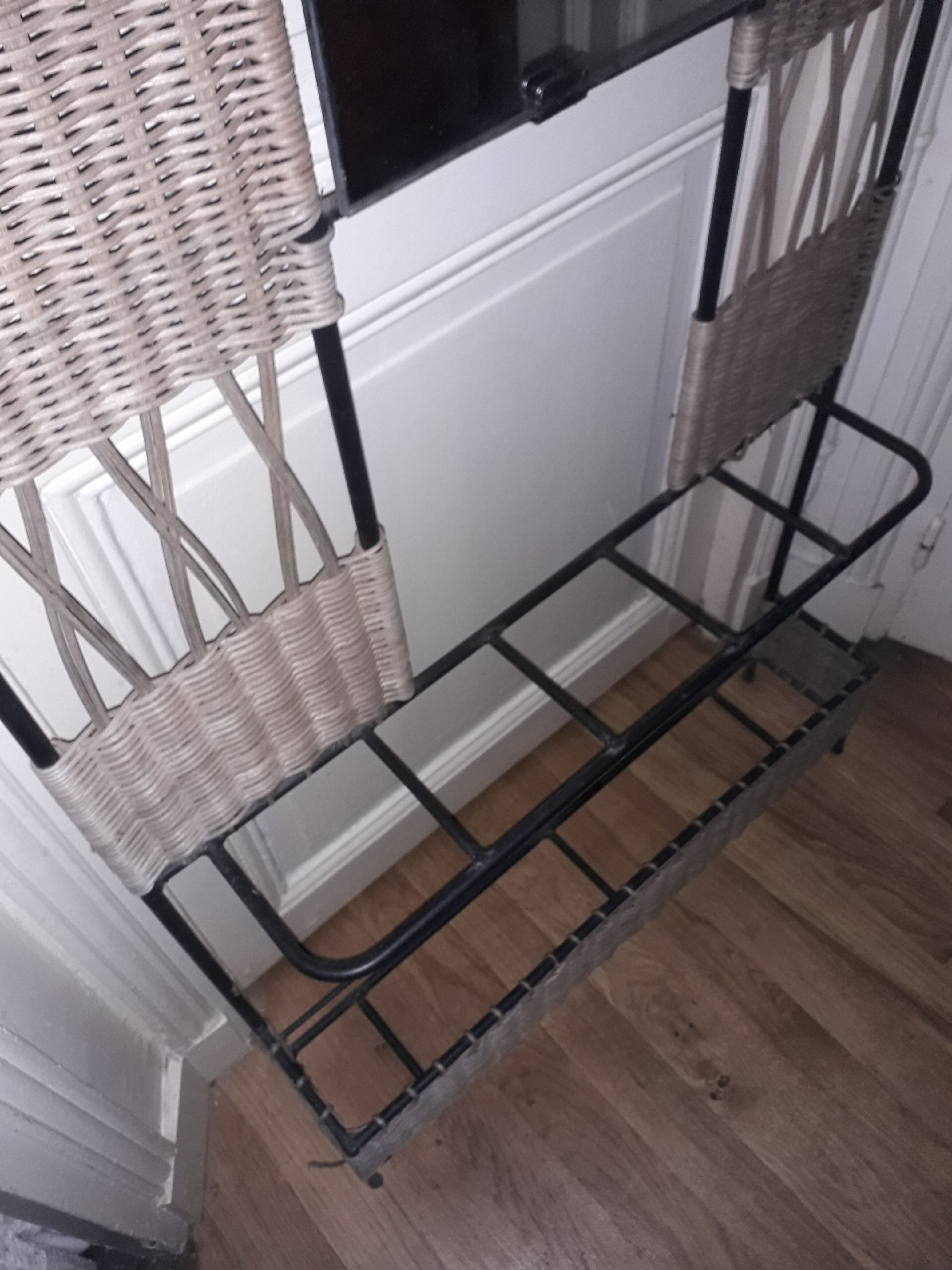 Metal and wicker coat holder