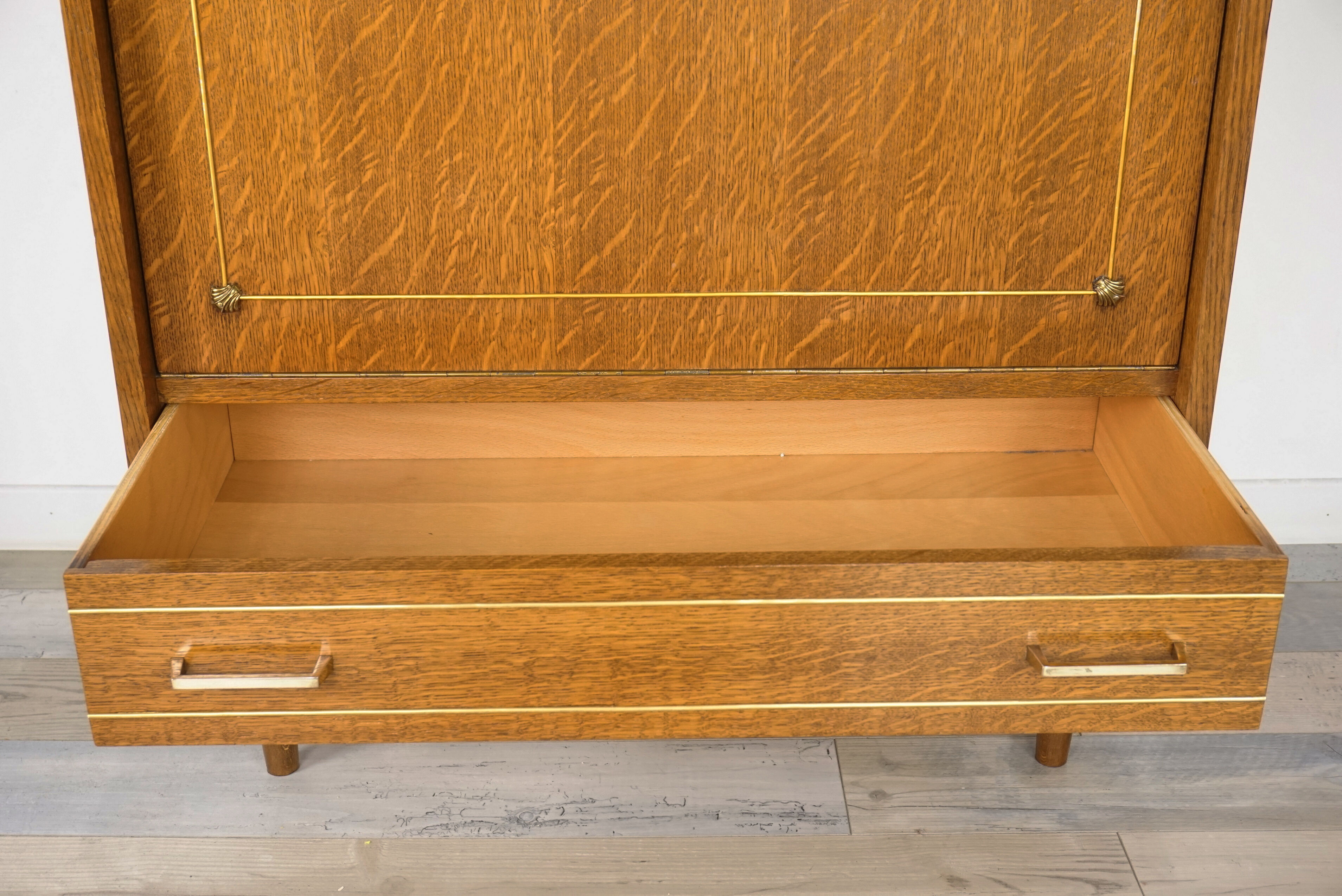 Bar storage in oak and brass, 50s - 60s
