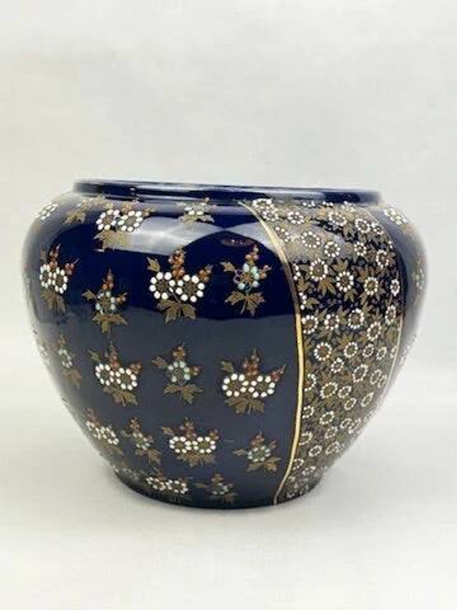Limoges porcelain flowerpot with gold enamel decoration and blue relief flowers from Four