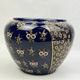 Limoges porcelain flowerpot with gold enamel decoration and blue relief flowers from Four