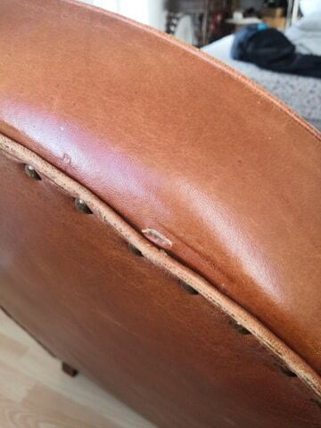 Tawny vintage leather club chair