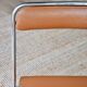 Pair of “Soudexvinyl” folding chairs in skai and chrome tube