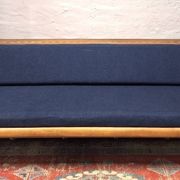 Sofa-lit convertible en teck danois avec compartiment pour dossier, années 1960.