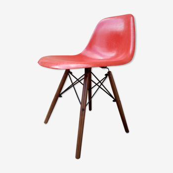 DSW red-orange Herman Miller chair by Charle and Ray Eames