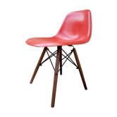 DSW red-orange Herman Miller chair by Charle and Ray Eames