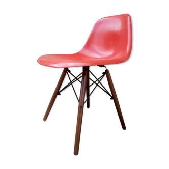 DSW red-orange Herman Miller chair by Charle and Ray Eames