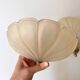 Pair of vintage shell glass wall lights, Art Deco style fixtures.