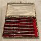12 stainless steel knives. vintage