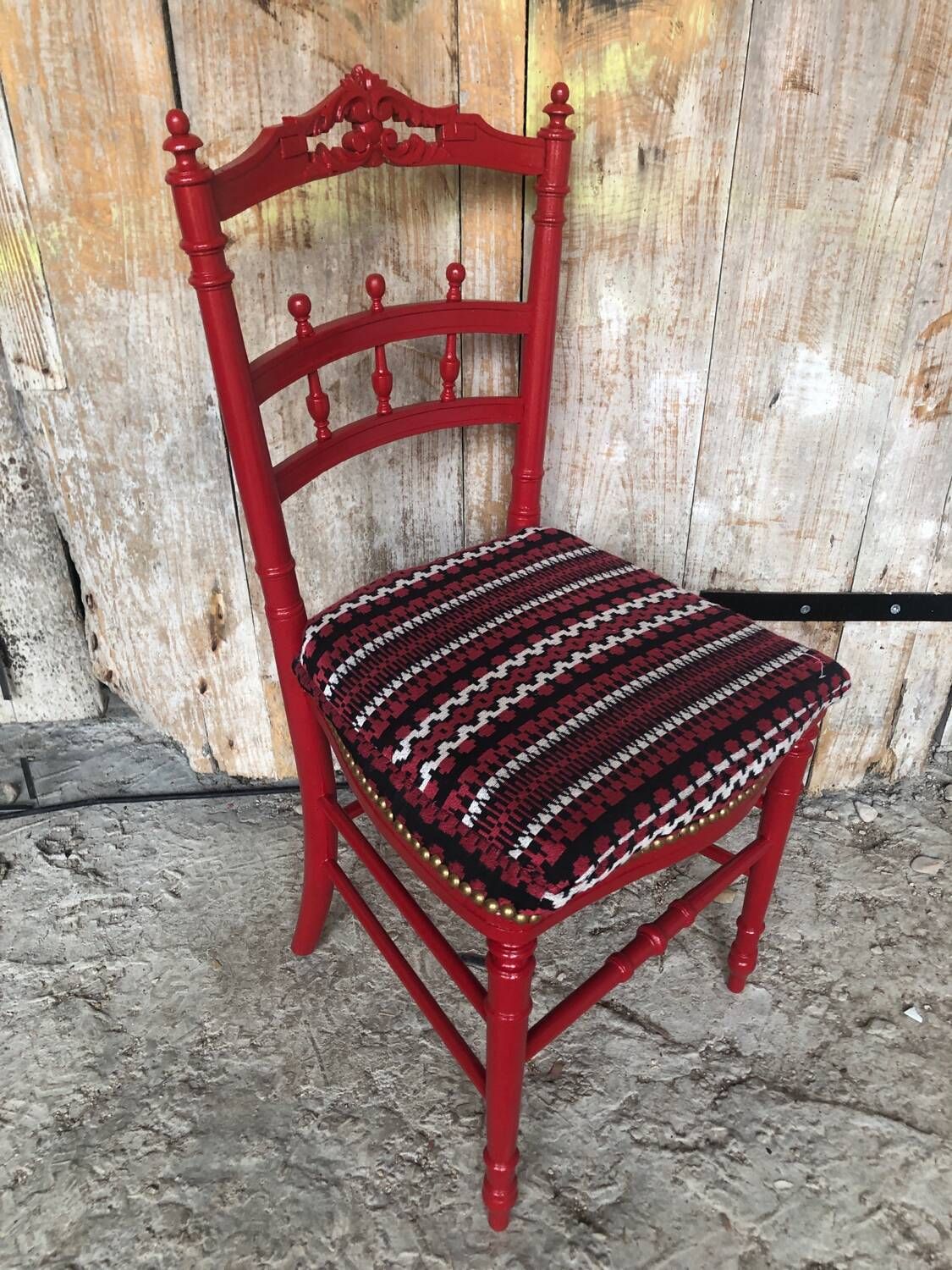 Red carved wood bedroom chair & vintage striped fabric seat