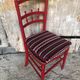 Red carved wood bedroom chair & vintage striped fabric seat