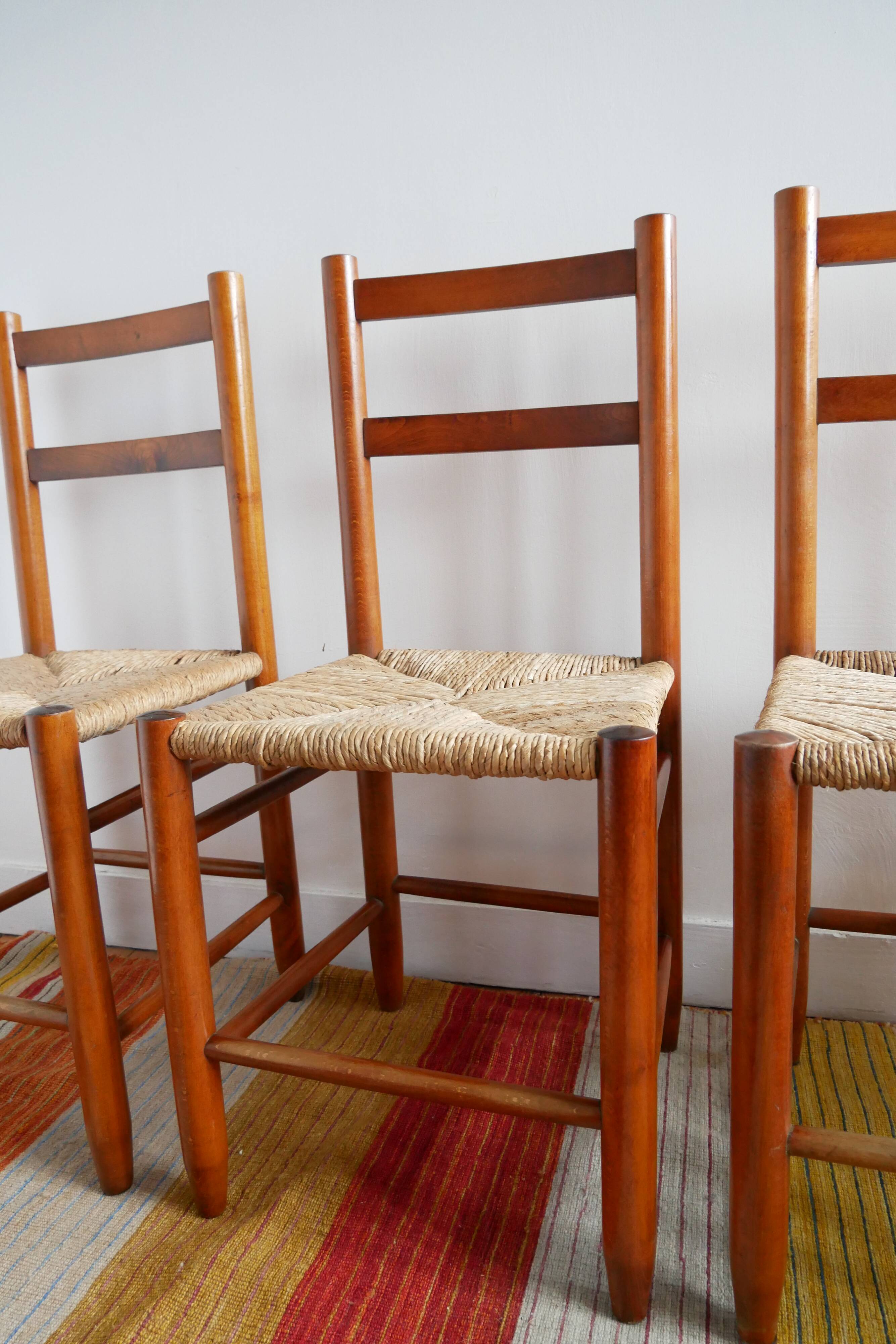 Set of 4 straw chairs and a stool