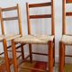 Set of 4 straw chairs and a stool