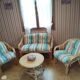Rattan lounge with removable cushions