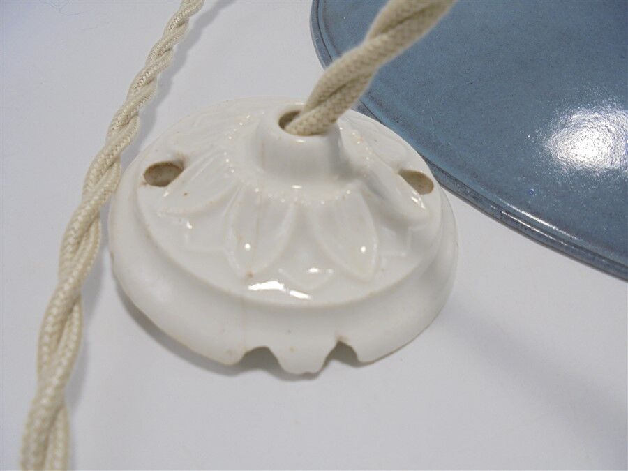 Enamelled sheet metal suspension