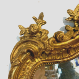 Mirror rocaille style Louis XV in wood and gilded stucco XX century