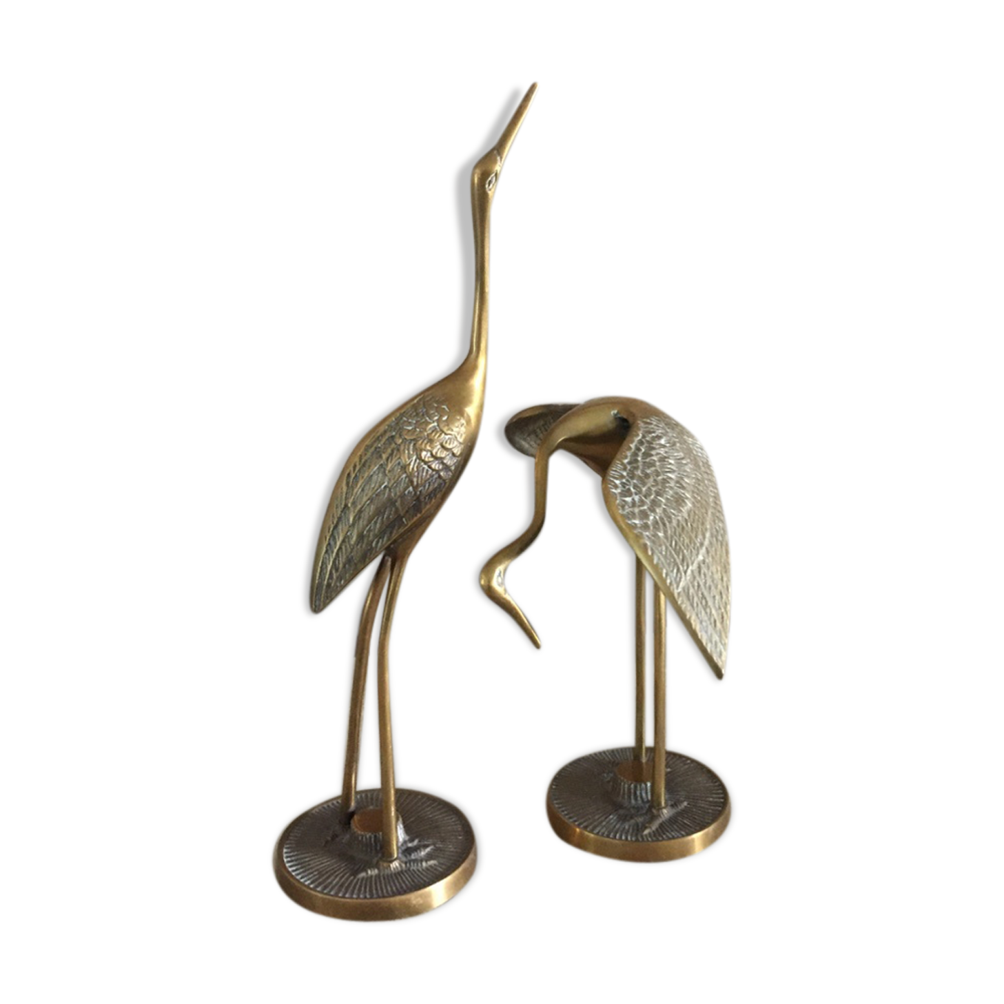 Couple of brass herons