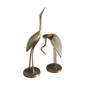 Couple of brass herons
