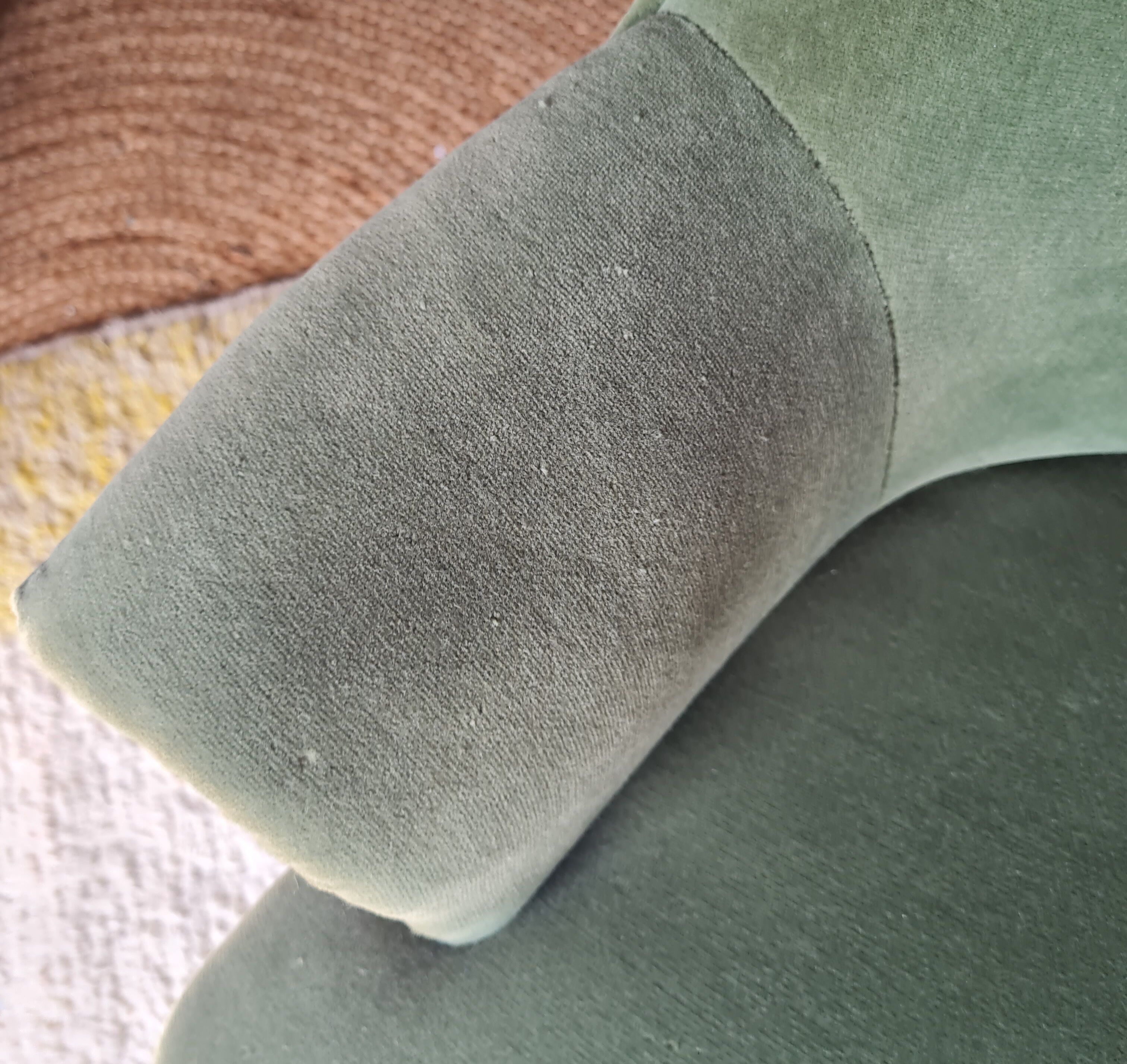 Green velvet armchair