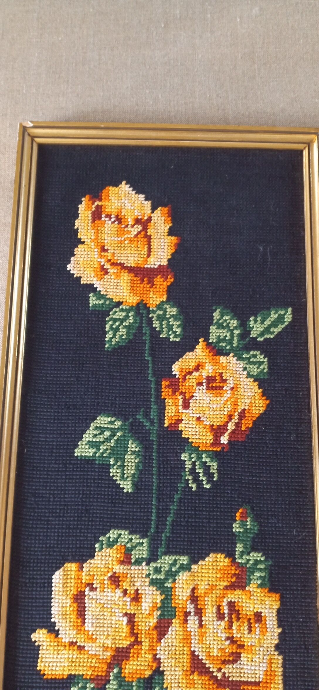 Golden frame with ancient canvas of yellow roses
