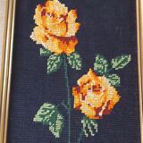 Golden frame with ancient canvas of yellow roses