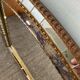 Large vintage brass and glazing bead mirror