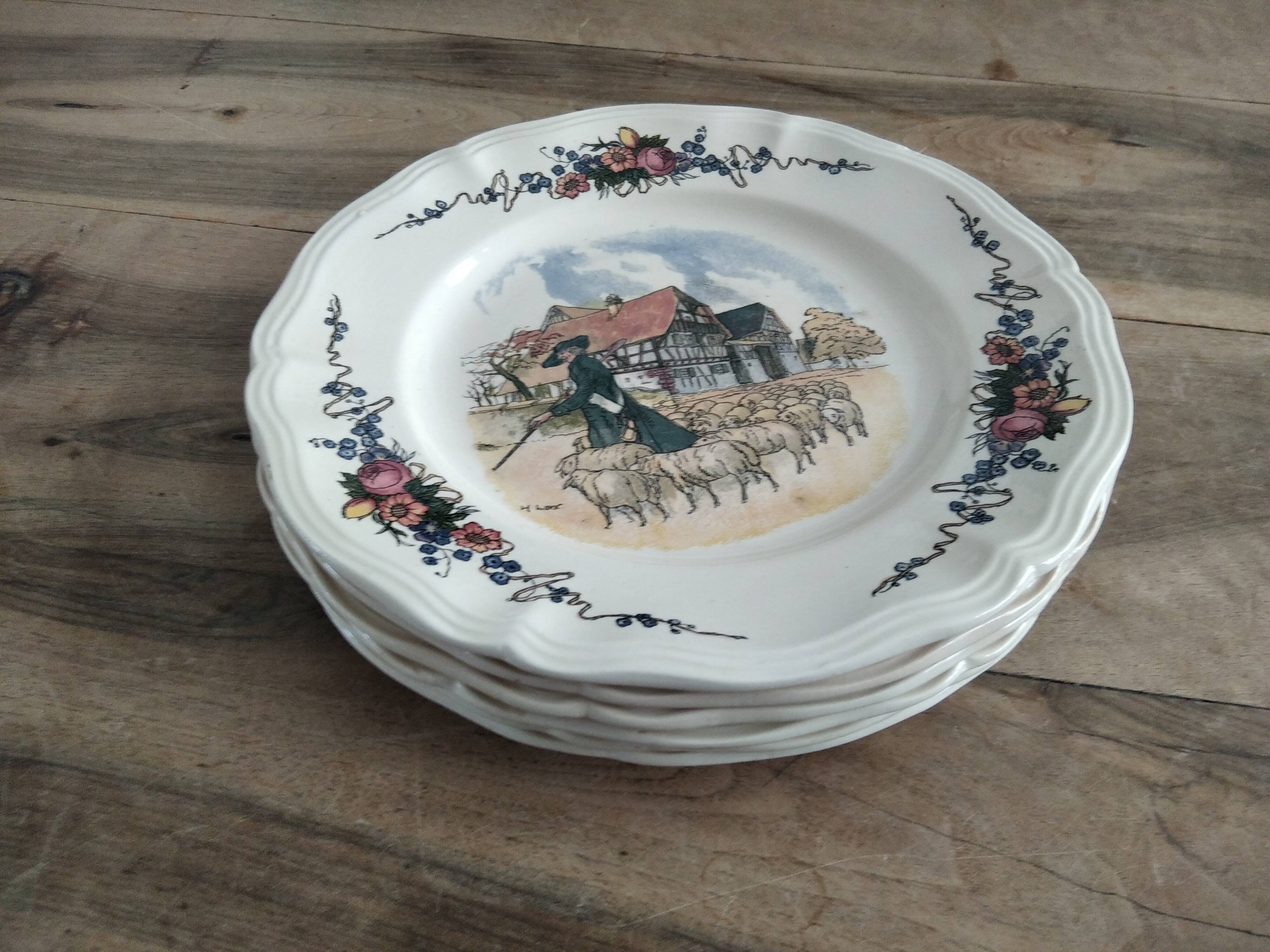6 plates of the obernai decoration service by Henri Loux