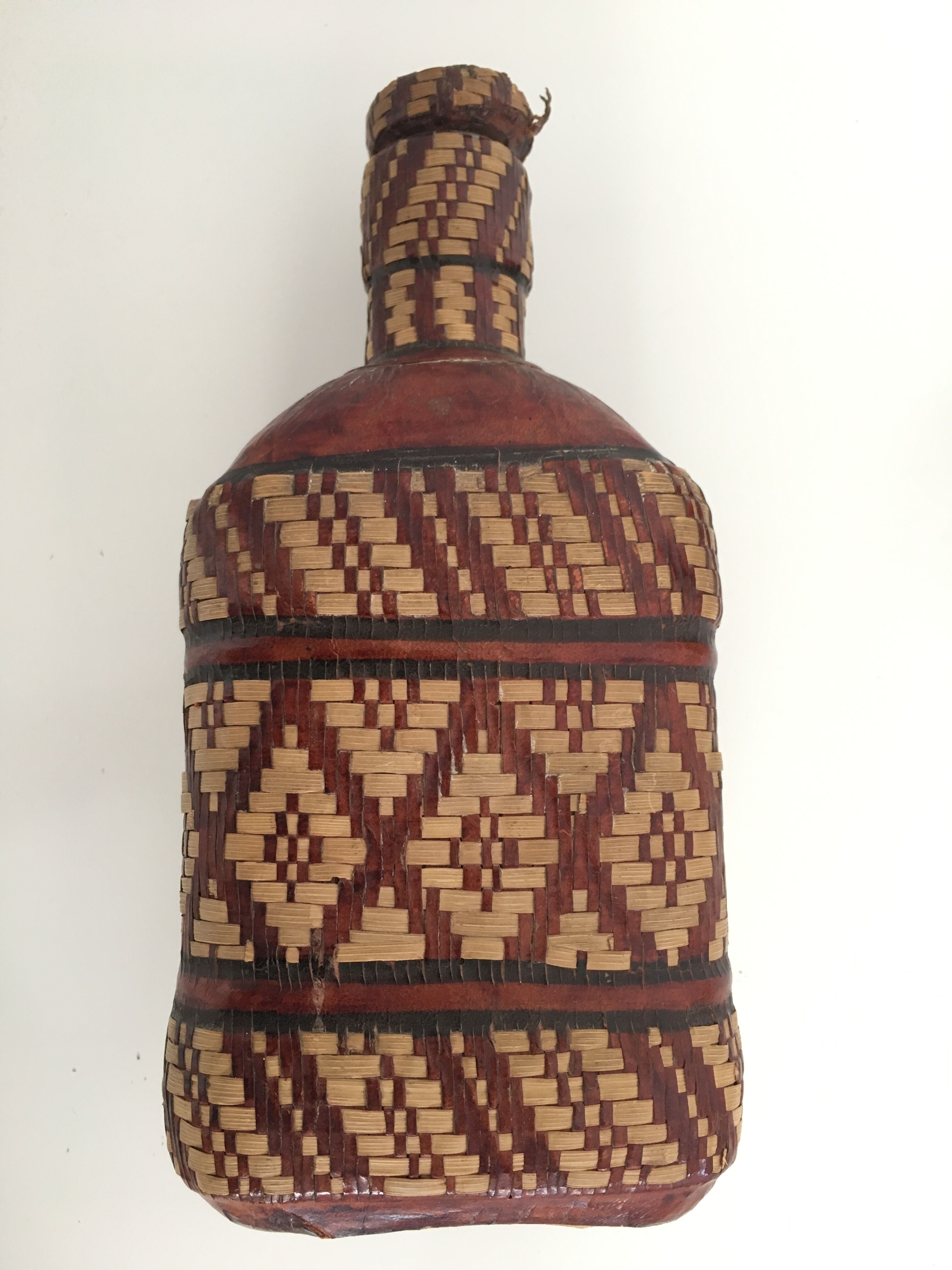 Lot of 2 ethnic leather-wrapped bottles and box