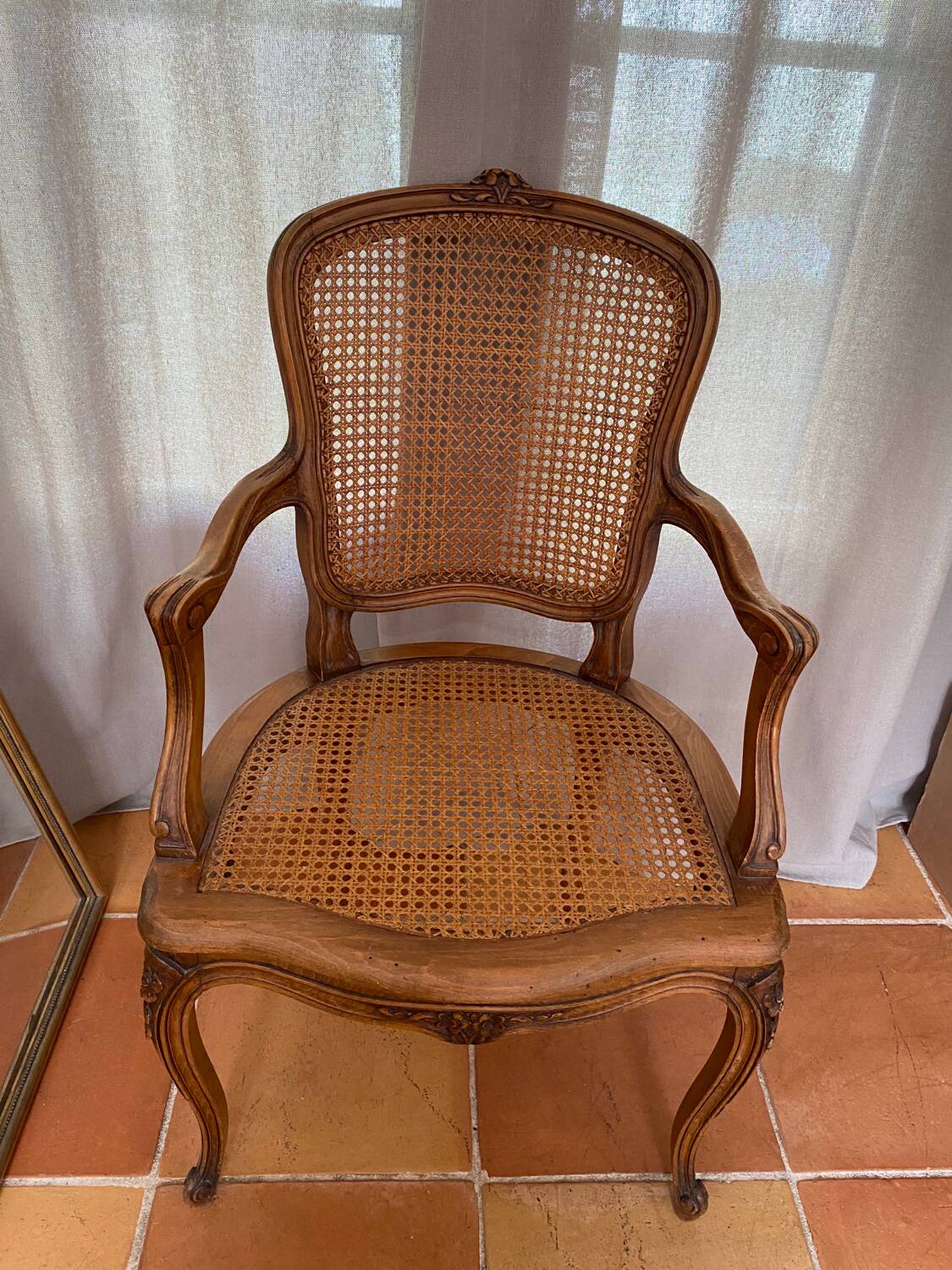 Louis XV style caned armchair