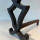Pair of Cast Iron Chenets with Figurative Anthropomorphic Silhouette, by Raymon