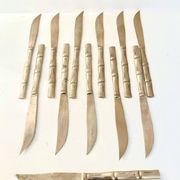 12 gold table knives, Hollywood Regency – circa 1970