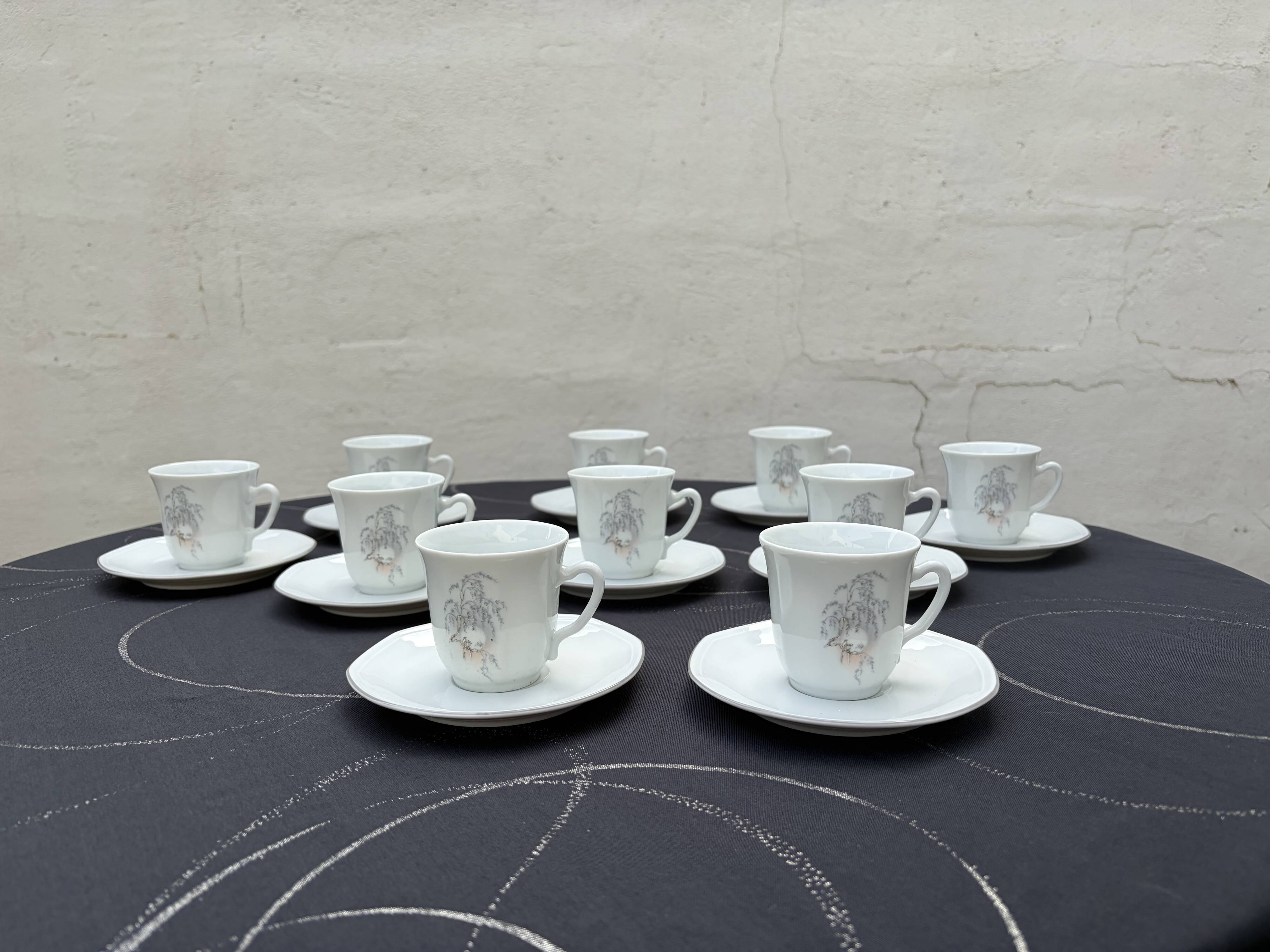 Set of 10 cups and 10 saucers porcelain from Sologne.