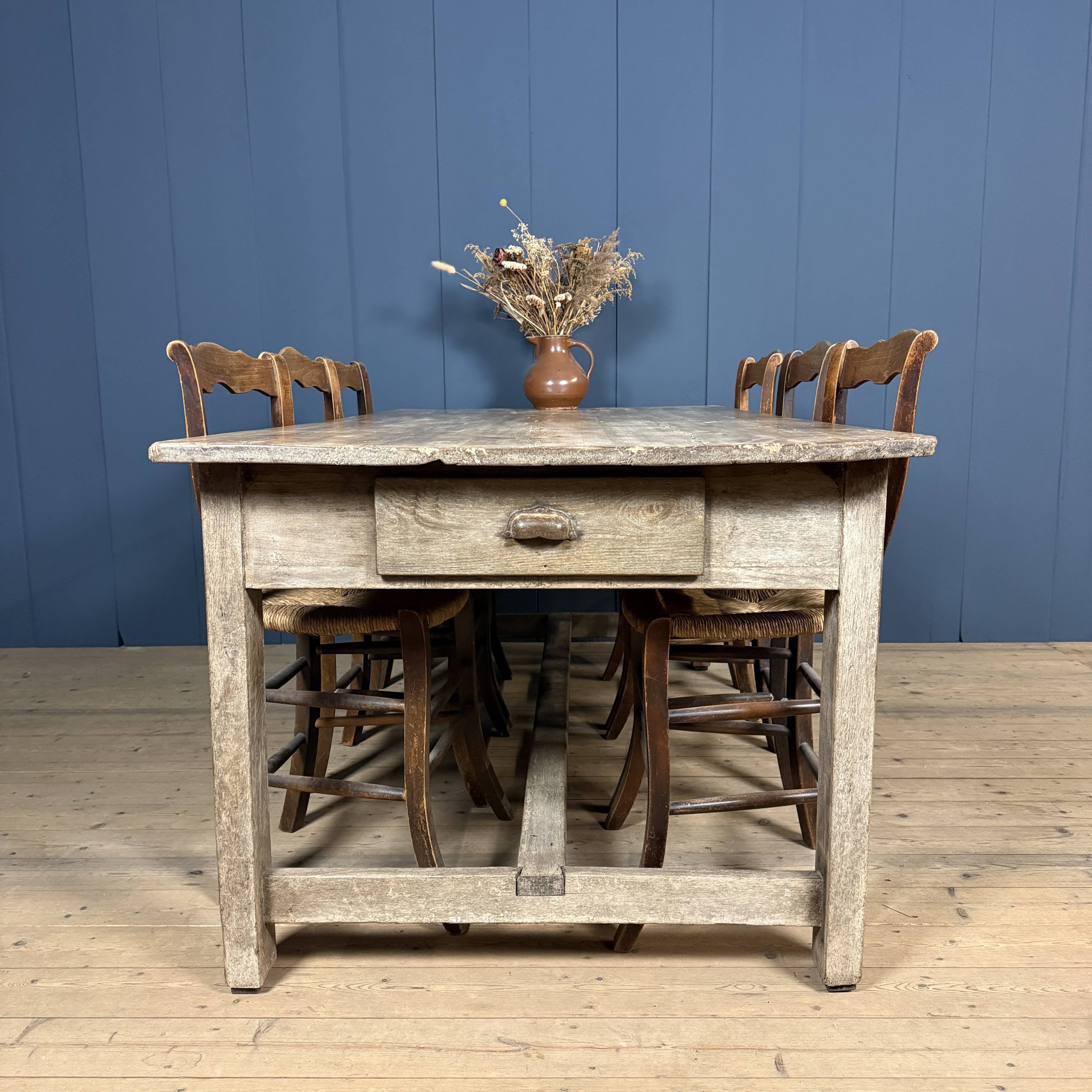 French farmhouse dining table with pine top and oak base