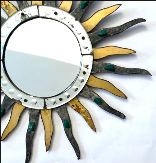 Sun-shaped mirror, wooden frame, circa 1980.