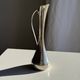 Vintage silver-plated soliflore vase in the shape of a ewer with a slender handle.