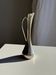 Vintage silver-plated soliflore vase in the shape of a ewer with a slender handle.